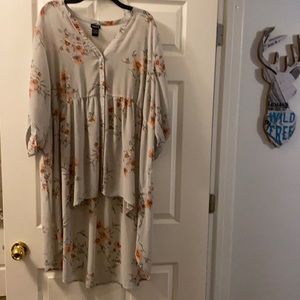 Very pretty high low button blouse